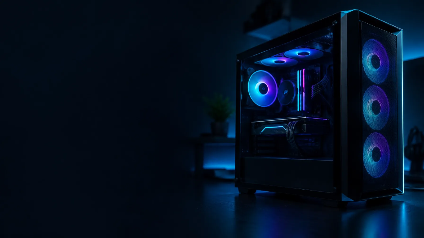 Gaming PC tower and components in a colorful setup